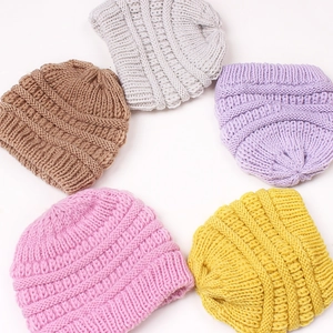 Cozy winter knit beanie hats for kids in brown grey purple pink and yellow colors