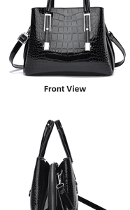 Vue de face du sac à main noir motif crocodile avec finition vernie et boucles argentées