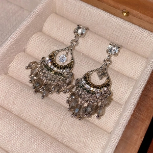 Silver needle drop fringe earrings with sparkling crystals and grey beads in a luxury style