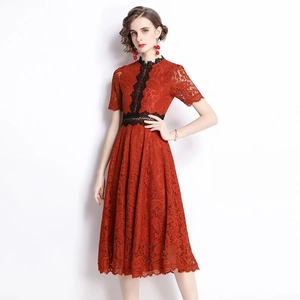 Elegant red lace midi dress with black embroidery accents and a flattering A-line silhouette