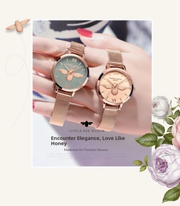 Détail de la montre à quartz avec cadran abeille 3D et bracelet milanais en or rose