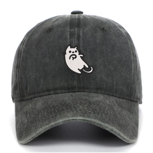 Close-up of detailed white cat embroidery on washed vintage charcoal cotton baseball cap