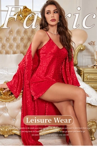 Detail of red leopard print satin robe and slip nightdress set in luxurious bedroom