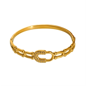 Elegant 18K gold plated stainless steel bangle with zircon horseshoe buckle clasp