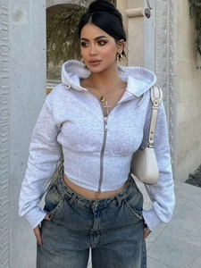 Detail of grey cropped zip-up hoodie with waist-defining seams and hooded neckline