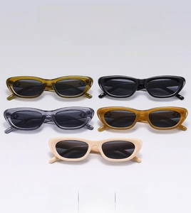 Detailed flat lay of vintage cat-eye sunglasses in five stylish assorted colors