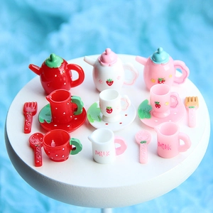 Mini strawberry resin teapot set for dollhouses featuring 14 pieces on white display stand