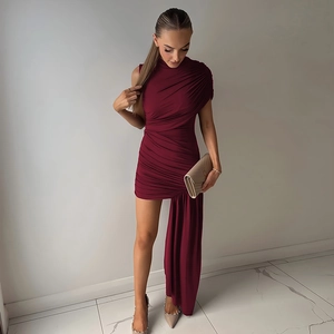 Detail of burgundy sleeveless mini dress featuring elegant side drape and ruched fabric