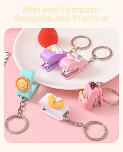 Detailed view of mini pastel stapler sets featuring cute 3D sun and moon charms