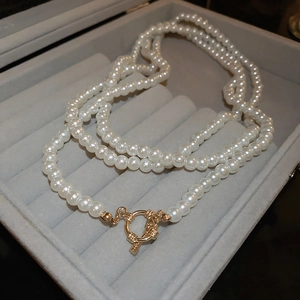 French vintage multi-layer pearl necklace with golden OT clasp on velvet box