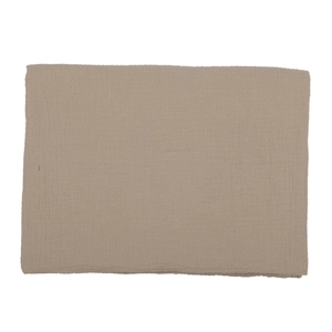 Folded light brown muslin cotton baby blanket with fringe and soft gauze texture