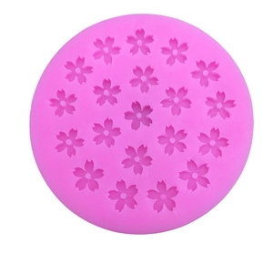 Pink silicone cherry blossom mold for flower-shaped chocolate and cake decorating