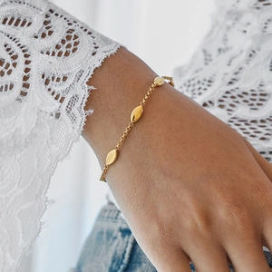 Classic 18K gold stainless steel bracelet featuring elegant marquise shape charms