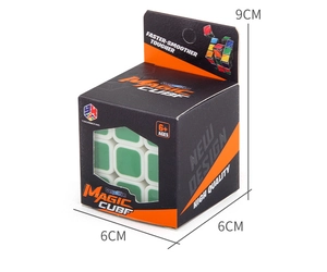 Detail view of smooth 3x3 speed cube with white and green panels in branded packaging