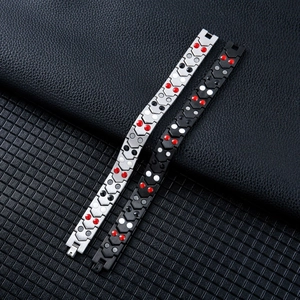 Men's magnetic stainless steel health bracelets in silver and black on leather background