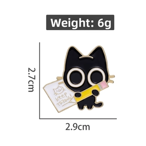 Detail of cartoon black cat enamel pin with Keep Trying text, size 2.7cm x 2.9cm