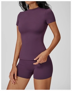 Close-up of dark purple quick-dry yoga set with high-elastic matte fabric for fitness