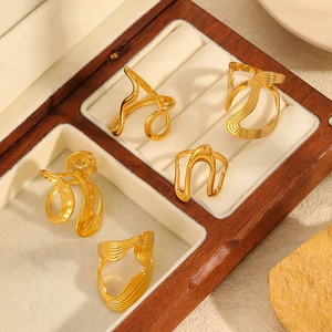 Unique 18k gold plated stainless steel snake wrap rings set in a wooden jewelry box