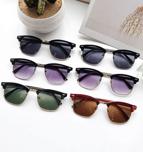 Classic half-frame retro sunglasses set with multiple lens colors and gold metal accents