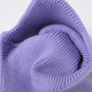 Purple ribbed knit beanie for women featuring warm thick fabric and turn-up cuff design