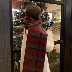 Classic red plaid scarf for women warm winter accessory paired with a white coat