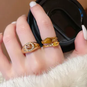 Gold plated open rings set with oval tiger eye and zircon stones for women