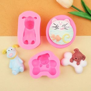 Detailed view of animal-themed silicone molds for DIY soap and fondant crafts