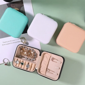 Portable travel jewelry organizer box with zipper for rings and necklaces in four colors