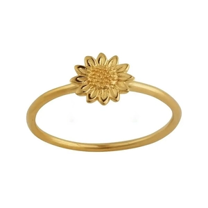 Detailed close-up of a golden sunflower ring with fine petal textures on a white background