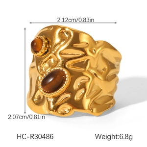 Detailed view of hammered texture ring with tiger eye stones and size dimensions