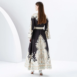 Floral paisley print long dress with flared sleeves and high-waisted A-line silhouette