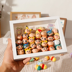White 3D shadow box display frame filled with Crayon Shin-chan mini figure characters