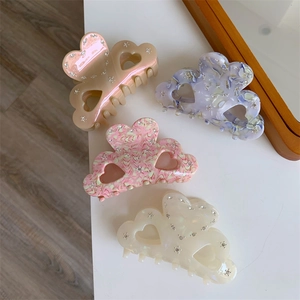 Elegant acetate heart-shaped claw clips with rhinestones in four assorted colors