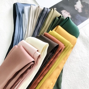 Elegant 2m solid satin silk scarves in multiple colors displayed in a fan-like layout