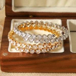 Bracelets élégants en acier doré et argenté avec double rangée de zircons dans un coffret