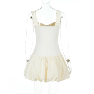 Rear view of white bubble hem mini dress with ruffled straps on a transparent mannequin