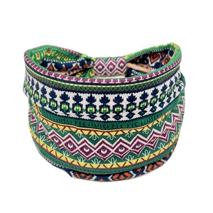 Detail of bohemian wide headband with ethnic geometric prints on flexible fabric