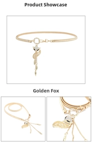Detail of golden fox pendant with rhinestones and metal tassels on thin elastic chain