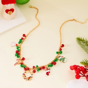 Gold Christmas charm bracelet with colorful bells, festive enamel pendants and rhinestones