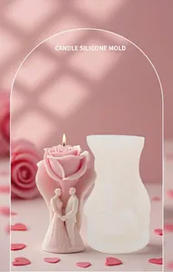 Macro view of silicone mold and rose bride groom candle with God of Love engraving