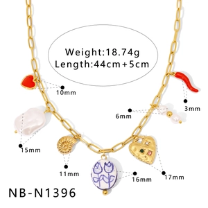 Detailed size and weight specs for a gold necklace with seashell and enamel charms