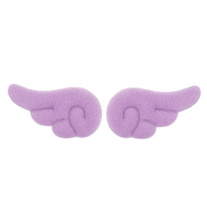 Close-up of small light purple plush angel wings DIY fabric accessories with soft texture