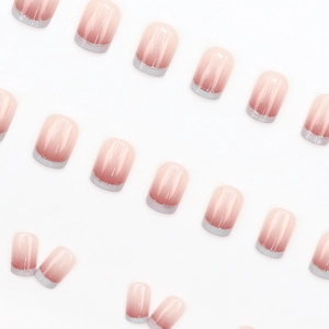 Short square press-on nails featuring pink gradient and silver french glitter tips