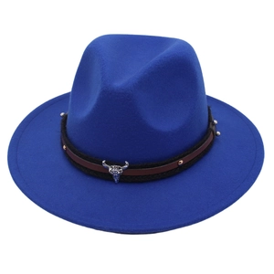 Close-up of royal blue wool fedora featuring a silver bull head ornament and woven band