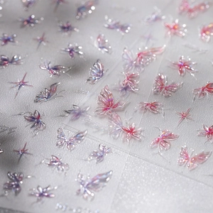 3D iridescent butterfly nail art stickers with glass texture and adhesive backing
