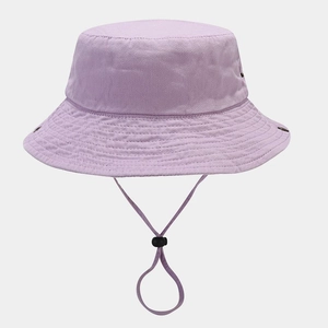 Close-up of light purple washed cotton bucket hat with adjustable chin strap and vent holes