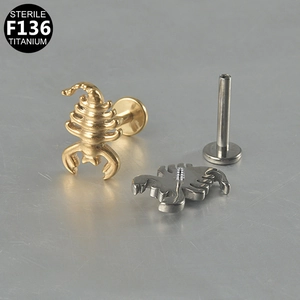 Macro detail of G23 titanium scorpion labret stud showing internal thread structure