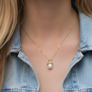 Elegant 18K gold-plated crown pendant necklace with round white pearl and colorful gems
