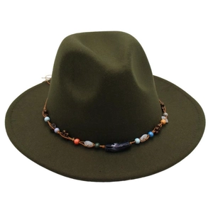 Detailed view of the dark green wool felt fedora hat featuring colorful beaded trim band
