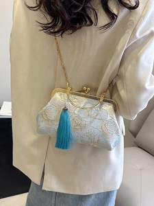 Floral embroidered shell bag with peacock blue tassel and gold chain strap for women